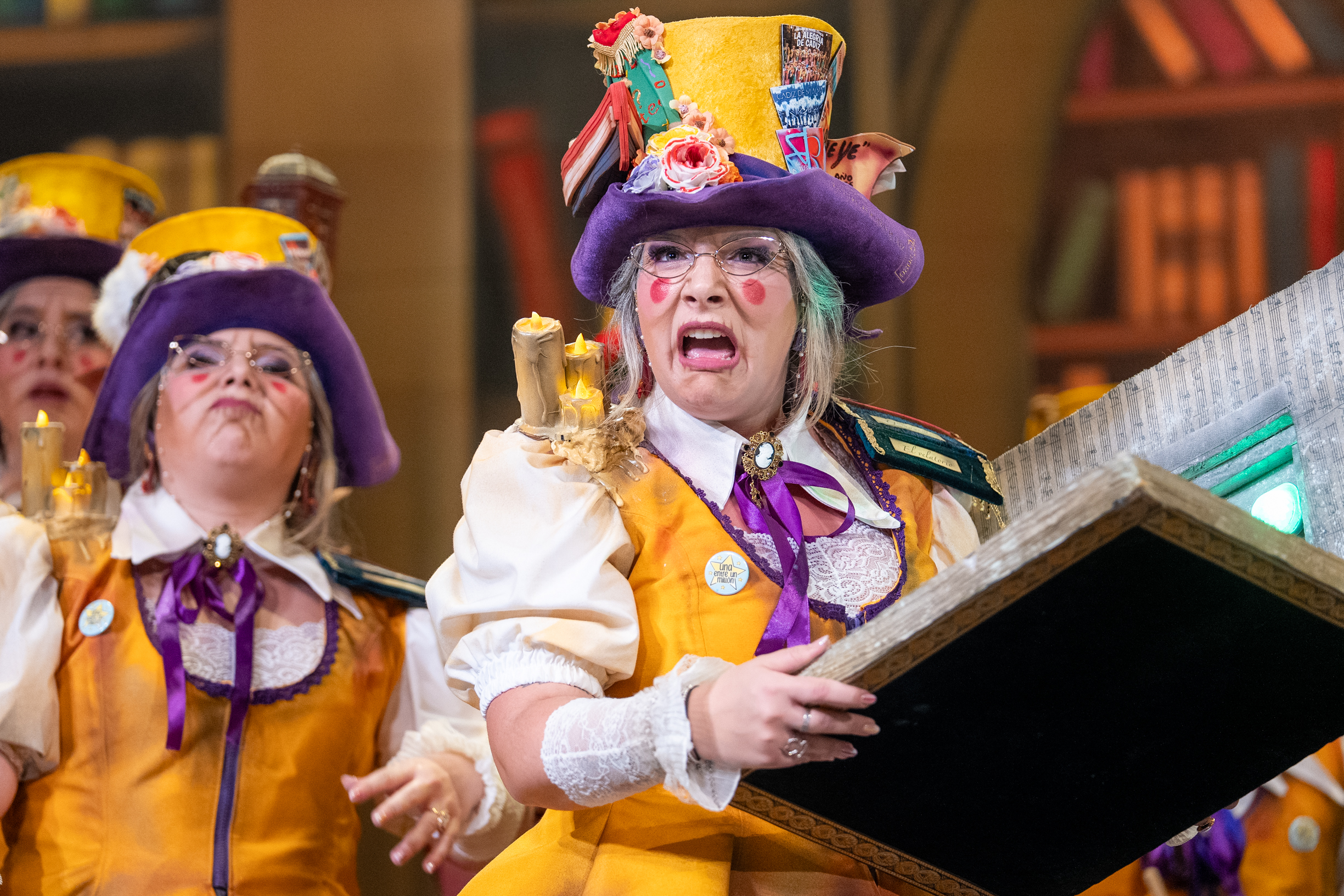 Comparsa, La biblioteca - Preliminares